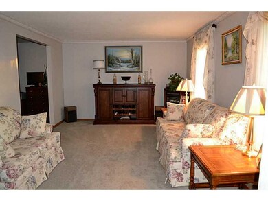 Living Room. Formal living room with crown molding