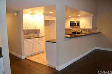 Kitchen open to family room.  Large breakfast bar.