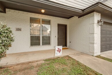 Property entrance with brick siding