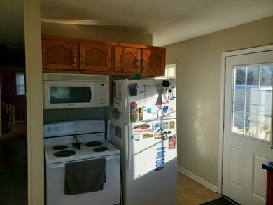 The kitchen leads to the back deck if you wanted to enjoy the outdoors for meals.