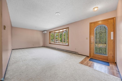 Living Room - with bay window and mini-split air conditioning