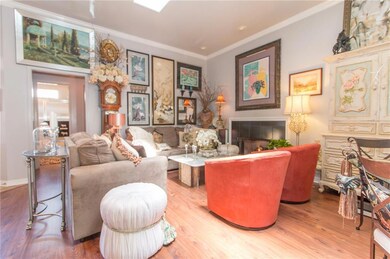 The open floor plan features the living room and f