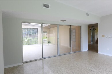 quad sliders open to courtyard.