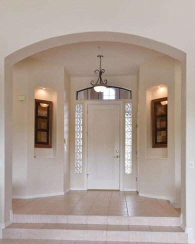 Entry - Foyer Opens to Living and Dining