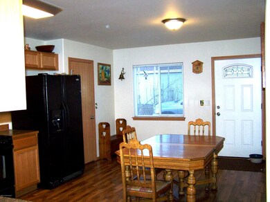 Kitchen toward garage and exit