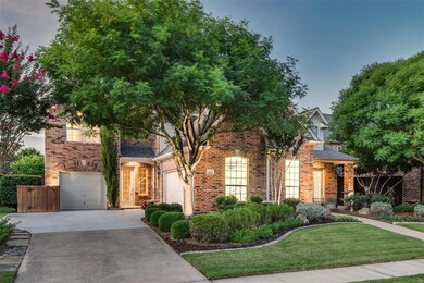 Three car garage and secondary entrance.