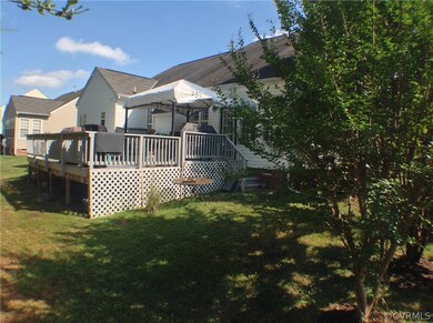 Side and back partial view, awning can stay or go.