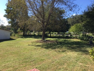 Far right side of backyard