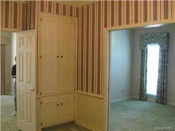 Dining room looking into living room/office with b
