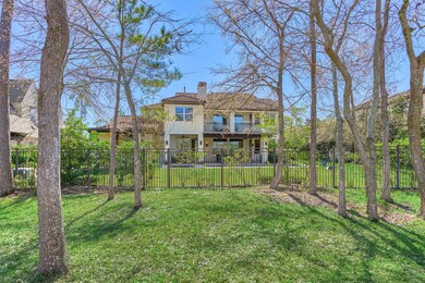 The rear of the property. The tress will be bloomi