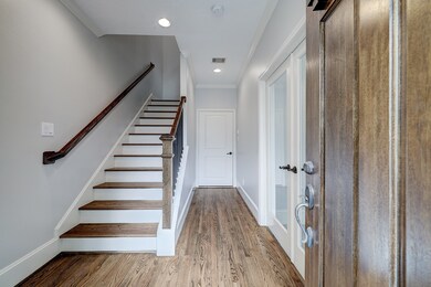 Hardwood floors shine throughout the home in commo