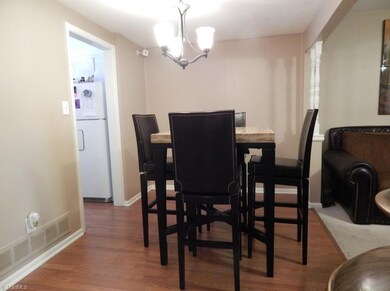 Laminate flooring in DR, Kitchen and Entry