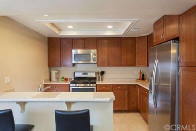 This kitchen has new cabinets, new lighting, fixtu