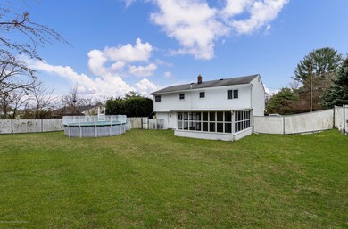 Fully Fenced Yard with Pool & Sunroom