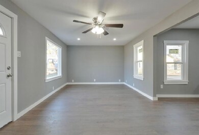 Entrance foyer with plenty of natural light, baseb