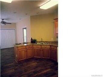 Large kitchen with plenty of cabinets and counter 