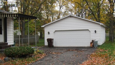 129 E Miller Rd, Lansing, MI 48911 - photo 4