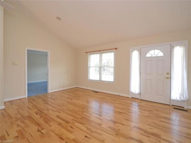 Great Room with high ceilings and gorgeous wood floors