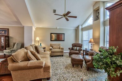 The living room is spacious and offers plenty of n