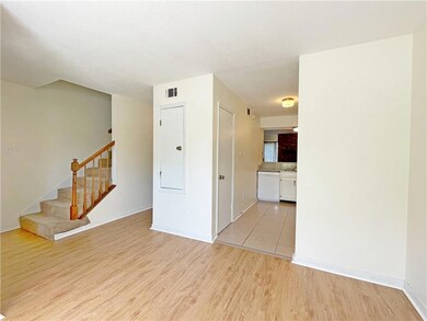 Unit 810: View of Dining Area and Kitchen.