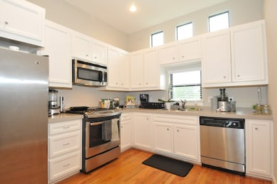 Beautiful kitchen with stainless steel appliances.