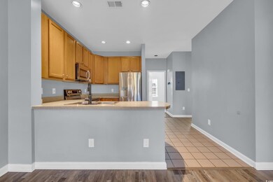 Kitchen with sink, stainless steel appliances, kit