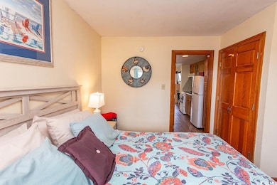 Bedroom featuring dark hardwood / wood-style floor