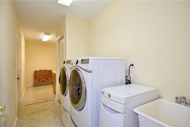 Ideal and convenient, the main level laundry room 