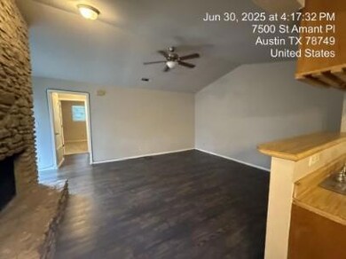 Unfurnished living room with a ceiling fan, vault
