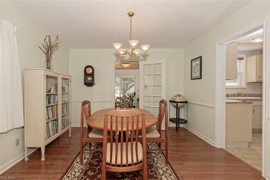 Dining Room and view to sunroom and kitchen