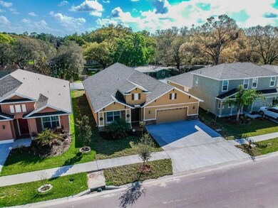 Aerial view of house and surrounding houses