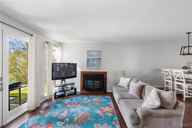 Living room featuring dark hardwood / wood-style f