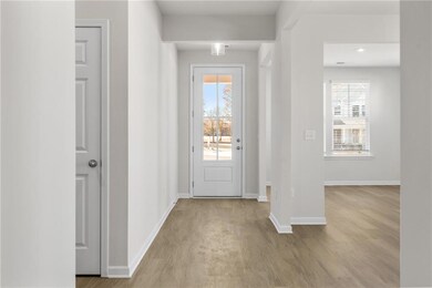 Foyer entrance with a healthy amount of sunlight a
