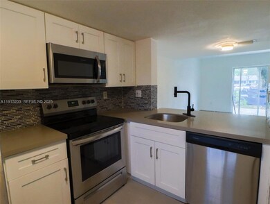 14010 NE 3rd Ct unit 1, Miami, FL 33161 - photo 2