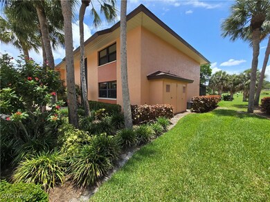 View of property exterior with stucco siding and a