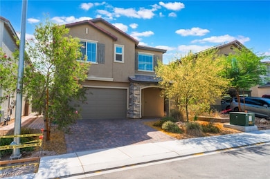 Traditional-style house with stucco siding, an att