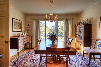 Formal dining room with tons of natural light!