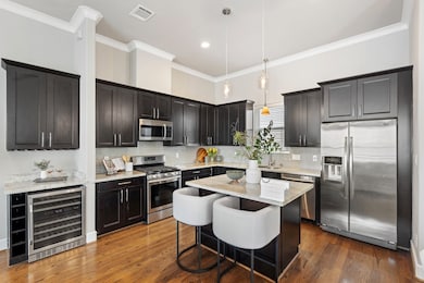 The kitchen is both stylish and functional, featur