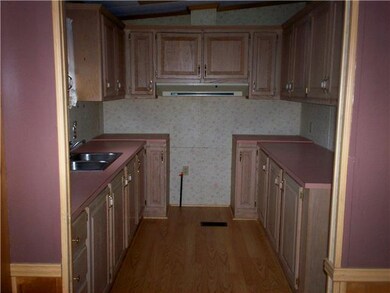 Kitchen. Lots of kitchen cabinets and work space. 