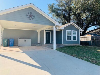 2 CARPORT AREA IS EXTENDED  WITH Room for Storage and SIDE DOOR LEADING TO STORAGE ROOM!