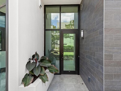 Entry door from 4th Street to this unique European design condominium residence in the Rosemary District.