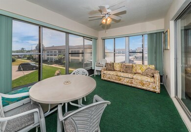 Light and Bright  Florida Room with water views.