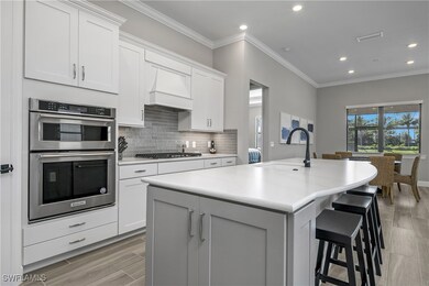 You'll enjoy plenty of room for entertaining guests with an oversized kitchen island, a kitchen cafe area, and an additional dining space.