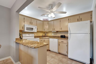 5900 Whispering Pine Way unit B-2, Greenacres, FL 33463 - photo 4