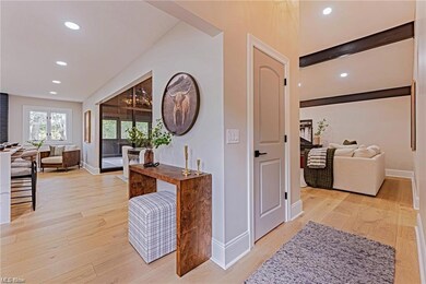 Hallway with light hardwood floors