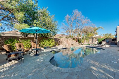 Travertine pavers throughout backyard