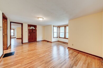Gleaming hardwood floors. Bright and light space.