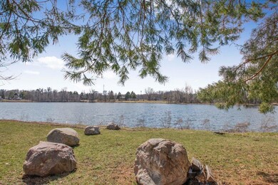 This townhome community is positioned along the shores of Boundary Creek Pond, is adjacent to a nearly 100 acre park w/baseball diamonds, playgrounds,cricket field & tennis court, hockey rink & next door to Elm Creek Park & 101st Bike Corridor