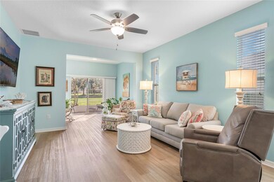 Pretty ice blue walls and luxury vinyl plank flooring