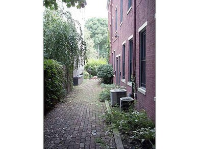 Exterior Back. Shared courtyard access to apartmen